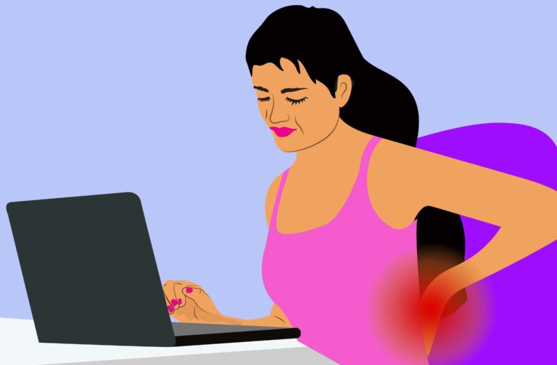 Cartoon shows a woman working at a computer. She is holding her lower back, which has a red spot indicating pain